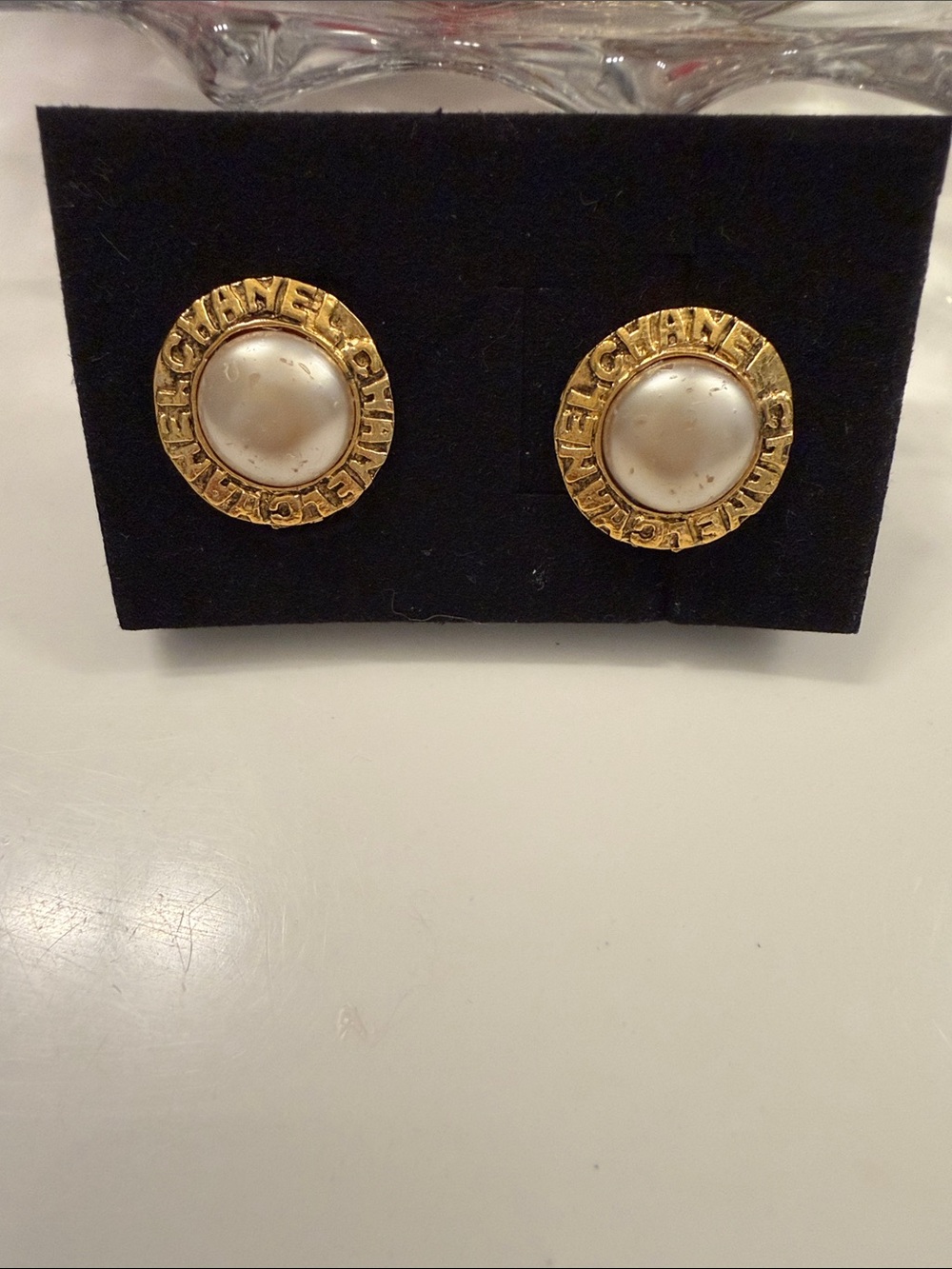 CHANEL Gold-Tone Round Logo Pearl Button Earrings